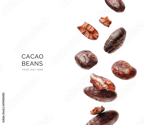Creative concept made of cacao beans on the white background. Flat lay. Food concept. Macro concept.	 photo