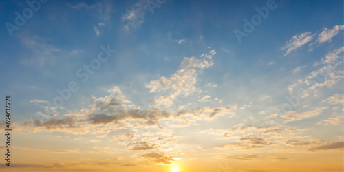 Sunset Sky adorned with Fluffy Clouds © Ohice