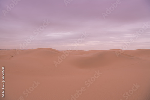 Dramatic sky over the never-ending sand dunes of Gobi desert in Inner Mongolia © Tatiana Kashko