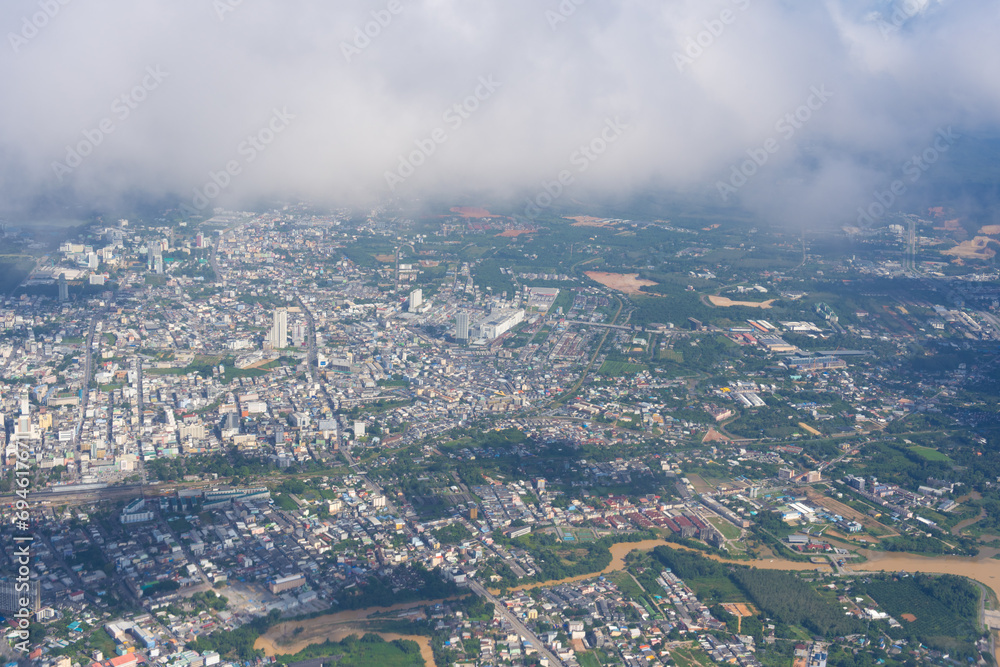 Obraz premium Aerial photography Aerial landscape of the vast city of Hat Yai, Songkhla, Thailand. Aerial photography. Top view, the beauty of the city