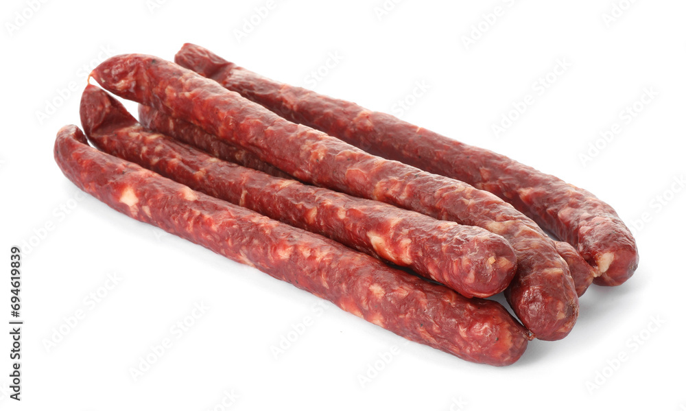 Thin dry smoked sausages isolated on white Thin dry smoked sausages isolated on white