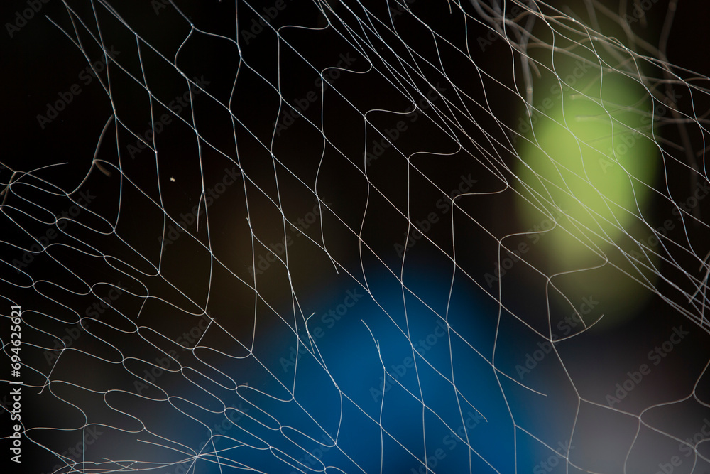 net in the dark, closeup of photo with shallow depth of field net in the dark, closeup of photo with shallow depth of field