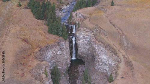 Bighorn water fall is flown over offering a spectacular point of view as seen from an aerial drone in the Ya Ha Tinda Ranch are of Alberta Canada. photo