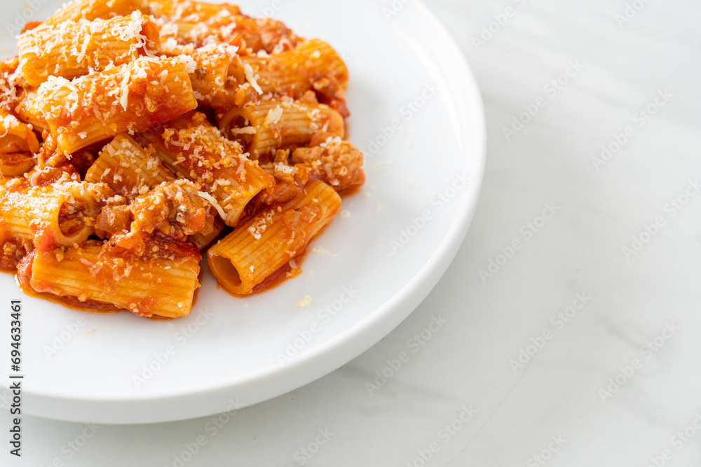 Rigatoni pasta bolognese with cheese Rigatoni pasta bolognese with cheese