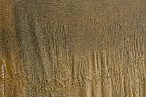 an wet cloth kept in sunlight for drying