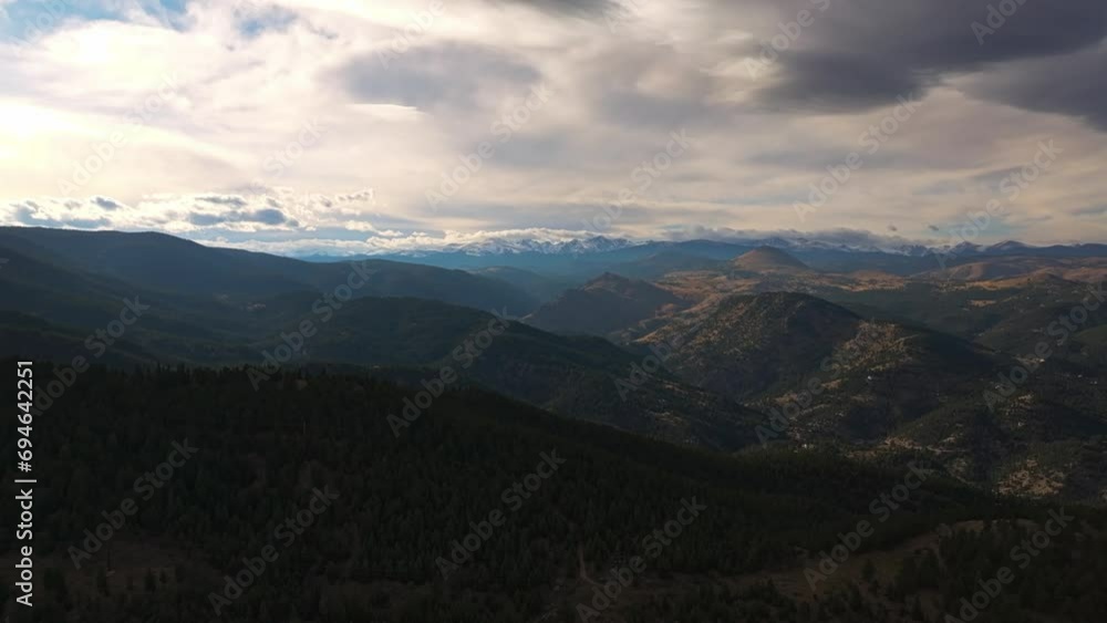 Cinematic dolly tilt up to Lost Gulch Overlook Boulder Colorado under grey stormy skies Cinematic dolly tilt up to Lost Gulch Overlook Boulder Colorado under grey stormy skies