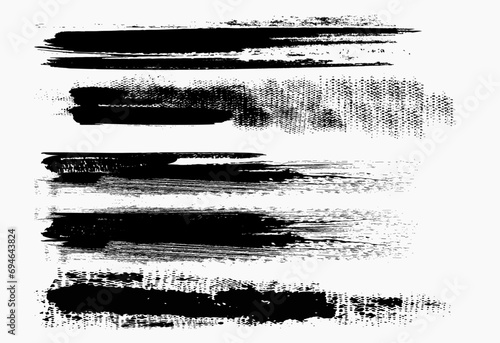 Abstract black long thick textured brush strokes isolated on white background