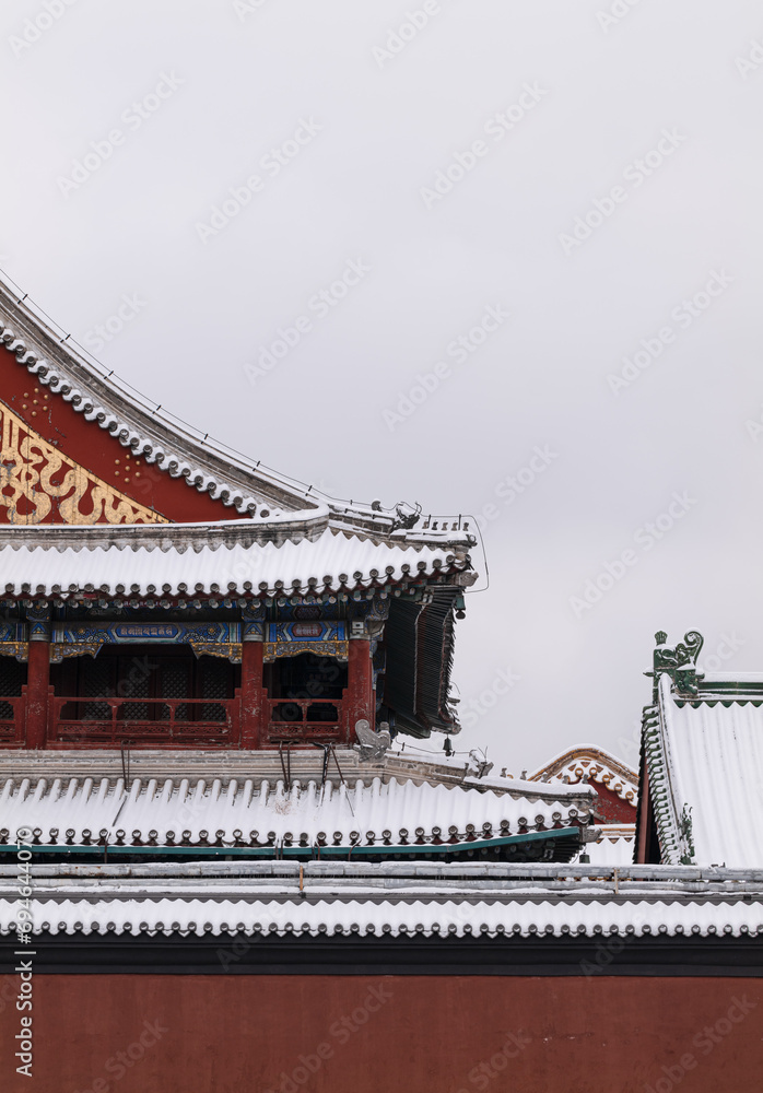 Chinese traditional building with snow against sky. Lama Temple, Beijing, China Chinese traditional building with snow against sky. Lama Temple, Beijing, China