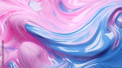 Pink and blue paint swirls creating a dreamy, abstract marbling effect.
