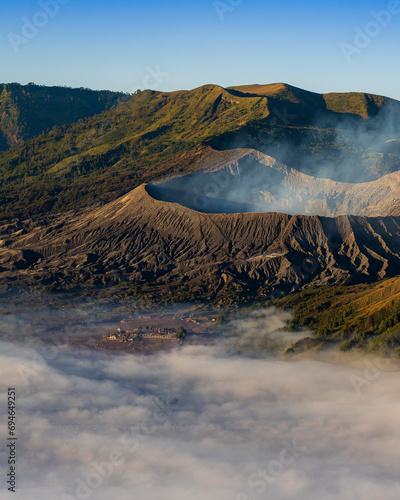 Landscape of Mount Bromo volcano during sunrise from a viewpoint located in Bromo Tengger Semeru National Park, East Java, Indonesia.

