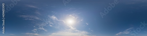 Blue summer sky panorama with light Cumulus clouds. Hdr seamless spherical equirectangular 360 panorama. Sky dome or zenith for 3D visualization and sky replacement for aerial drone 360 panoramas.