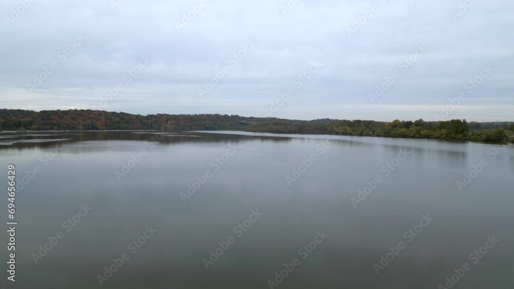 Rise over lake at Creve Coeur Park in Missouri, aerial drone Rise over lake at Creve Coeur Park in Missouri, aerial drone