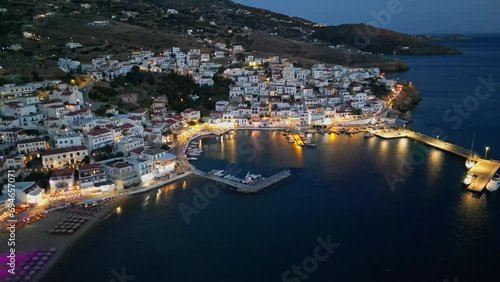 Wallpaper Mural Aerial drone view of  village of Batsi with traditional taverns and clear water beach, Andros island, Cyclades, Greece, at dusk Torontodigital.ca