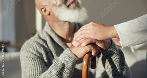 Support, walking stick and hands of senior man with a cane for help, trust and old age caregiver care for patient. Healthcare, empathy and elderly person in a nursing home for medical health comfort photo