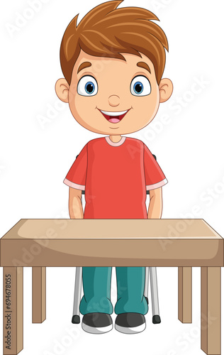Cartoon little boy studying on the desk