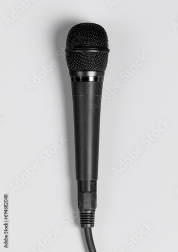 black wired microphone isolated on white