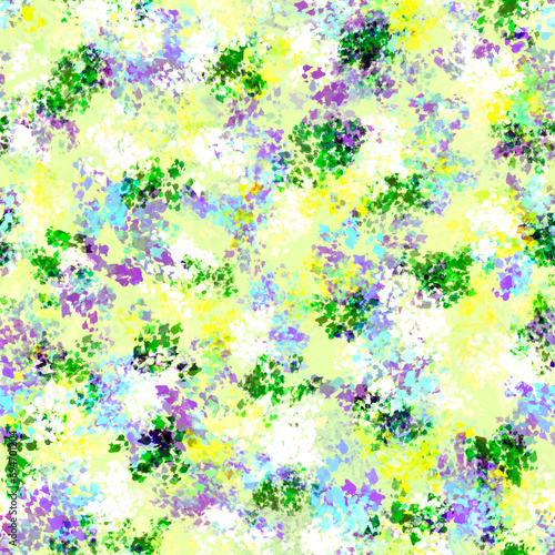 Small multi-colored random mixed paint stains on a light-yellow background Abstract multicolor blur painted layered seamless pattern