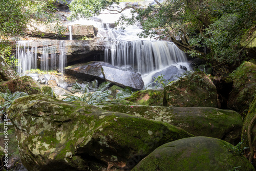 Waterfall in the rainforest At Pen Phop Waterfall, Phu Kradueng National Park, Thailand photo