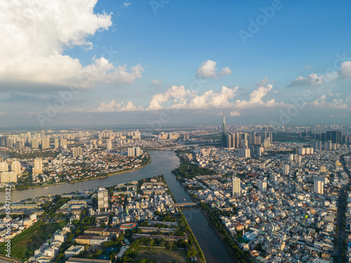 Wallpaper Mural Panoramic view of Saigon, Vietnam from above at Ho Chi Minh City's central business district. Cityscape and many buildings, local houses, bridges, rivers Torontodigital.ca