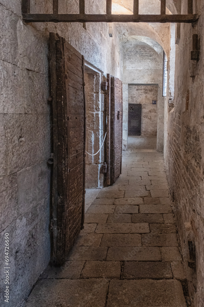 Fototapeta premium Venice, Italy - June 22, 2023: Doge's palace prison interior