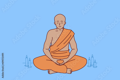 Buddhist manah meditates sitting in lotus position in tibetan temple to achieve spiritual harmony. Buddhist hermit sits alone wishing to comprehend true enlightenment thanks to zen ideology