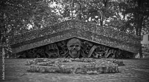 A sarcophagus at Saint Anthony of Padua Church in Bihac, Una-Sana Canton, Federation of Bosnia and Herzegovina. Dating from 1896, it is known as Tomb of Bihac Nobility or Tomb of Croatian Aristocracy photo