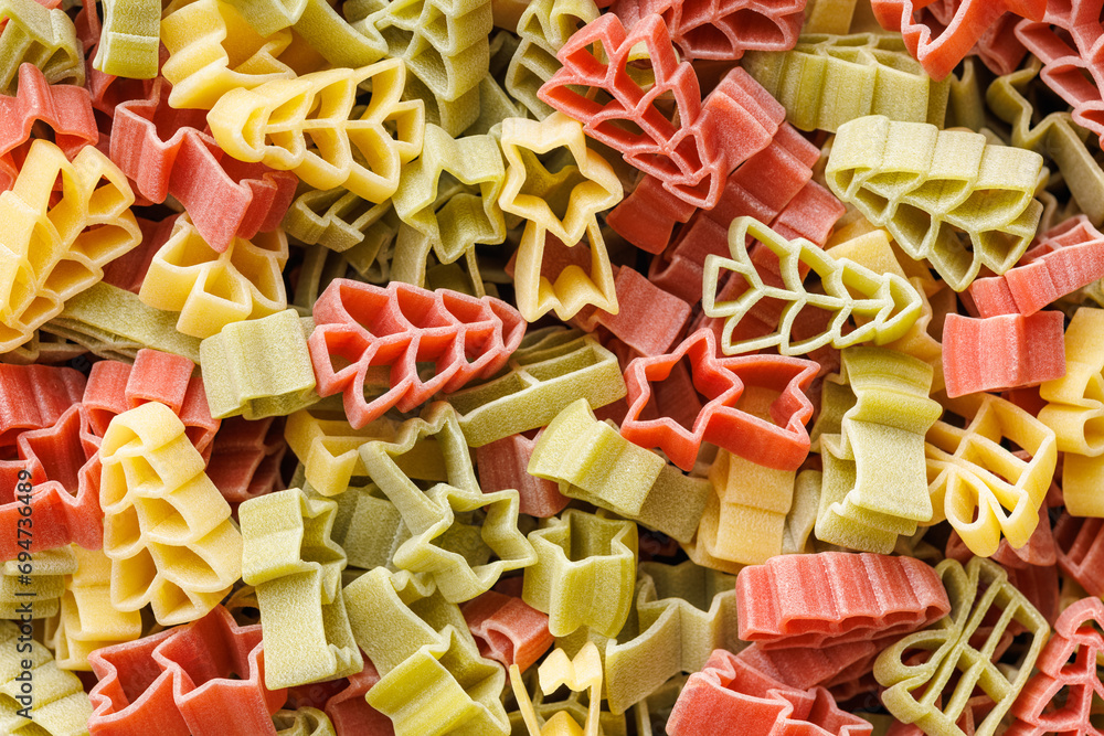Uncooked raw pasta. Various Christmas shapes. Top view.