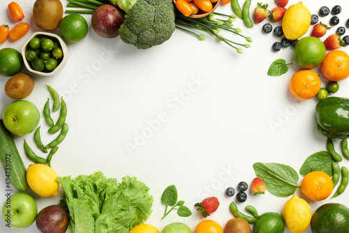Healthy food background with organic fruits and vegetables photo
