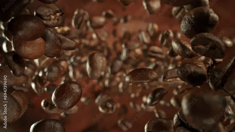 Super Slow Motion Detail Shot of Coffee Beans Falling Down From Behind Camera at 1000fps.