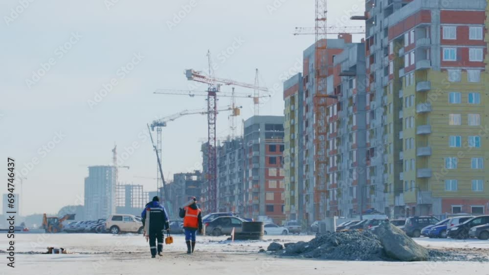 Builders going to construction site Builders going to construction site