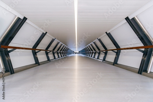 Empty modern subway tunnel with illuminated light photo