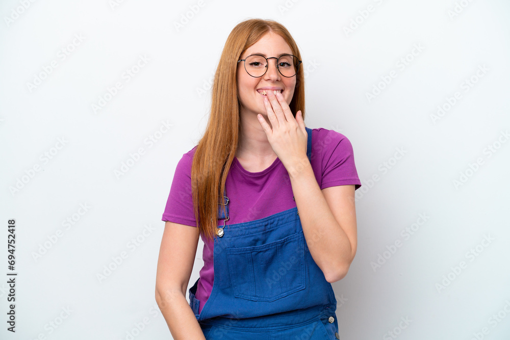Young redhead woman isolated on white background happy and smiling covering mouth with hand Young redhead woman isolated on white background happy and smiling covering mouth with hand