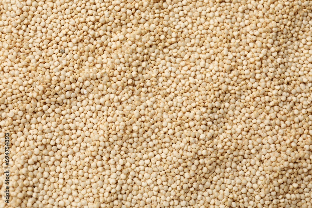 Raw quinoa seeds as background, top view Raw quinoa seeds as background, top view