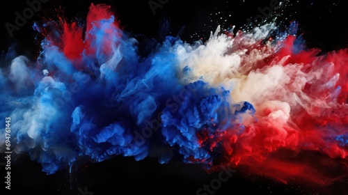 Red, blue, and white powder explosion on black background. Splashes of Holi paint powder in the colors of the French and Dutch flags
