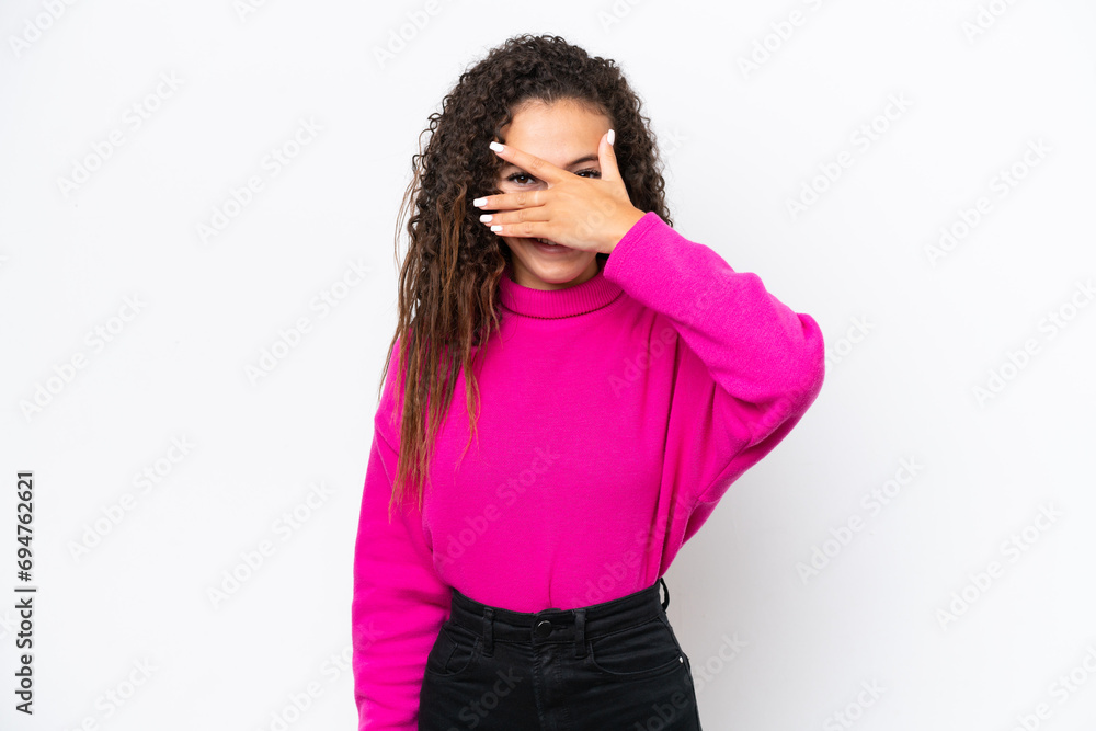 Young Arab woman isolated on white background covering eyes by hands and smiling Young Arab woman isolated on white background covering eyes by hands and smiling