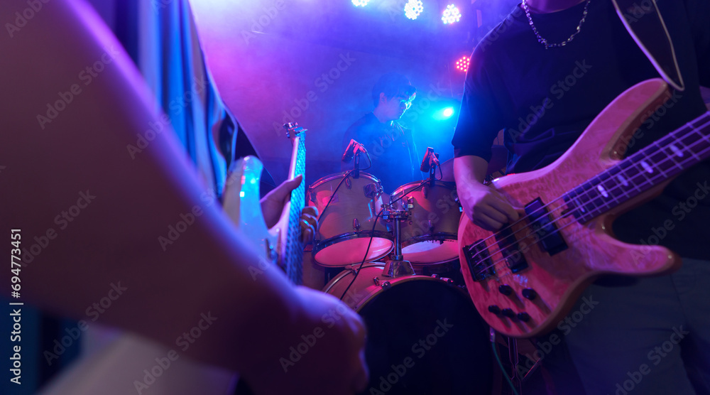 Obraz premium Young band performing on stage