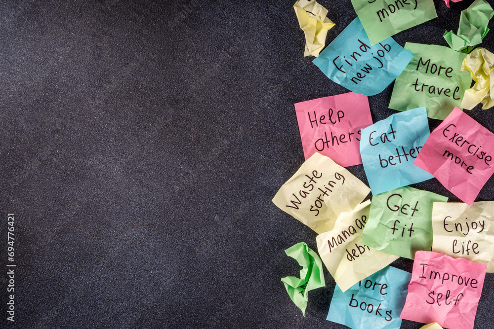 New year goals on bright colorful paper stickers New year goals on bright colorful paper stickers