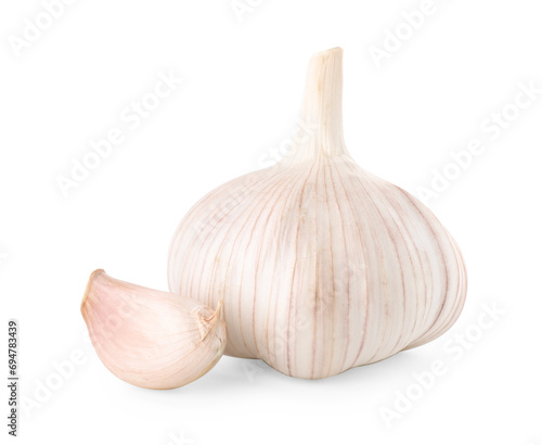 Fresh head of garlic and clove isolated on white