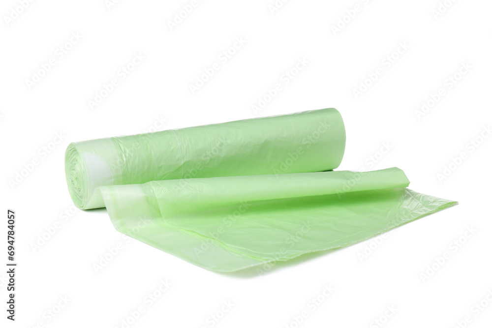 Fototapeta premium PNG, Roll of green garbage bags, isolated on white background