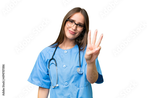 Young nurse caucasian woman over isolated background happy and counting three with fingers