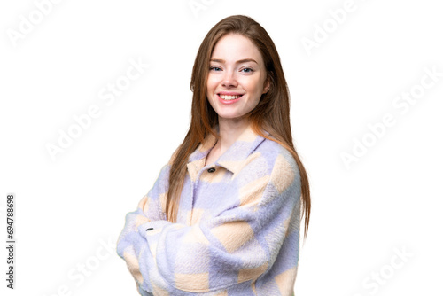 Young pretty woman over isolated chroma key background with arms crossed and looking forward © luismolinero