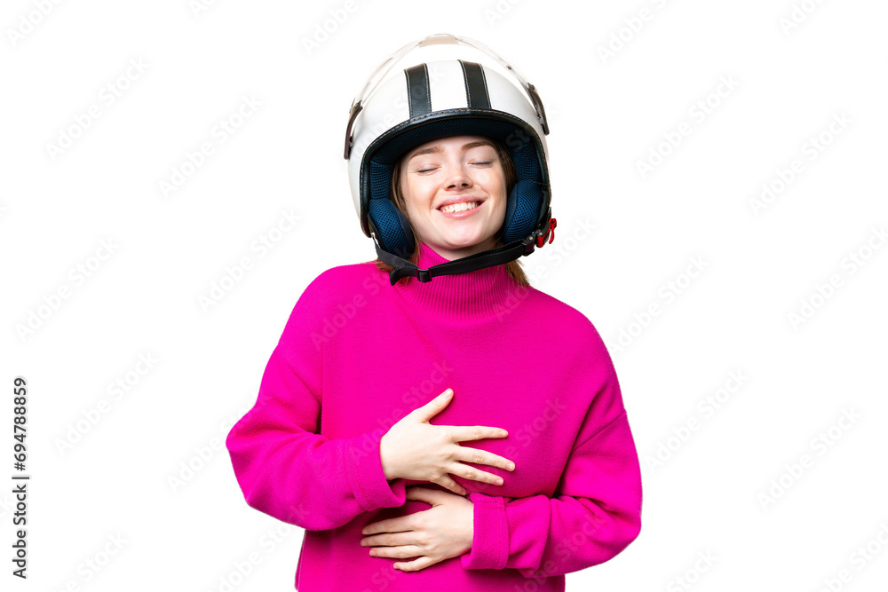 Young pretty woman with a motorcycle helmet over isolated chroma key background smiling a lot Young pretty woman with a motorcycle helmet over isolated chroma key background smiling a lot