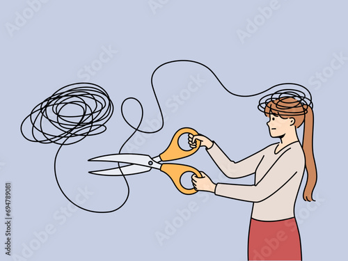 Woman gets rid of mental problems by cutting off tangled threads coming from head with large scissors. Girl struggles with mental disorder that causes psychological discomfort and melancholy