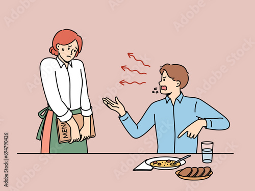 Man restaurant visitor shouts at woman waiter because food is not tasty or mistake made by cafe staff. Poor quality and slow service in restaurant caused dispute between guest and staff