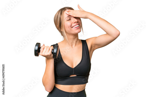 Blonde sport woman making weightlifting over isolated chroma key background has realized something and intending the solution