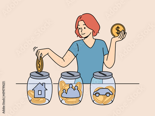 Woman is engaged in financial planning, putting earned money into different glass jars with picture of car and house or family. Girl invests in own future thanks to financial literacy