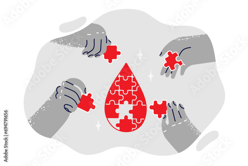 Puzzle in shape of drop of blood with people hands calling attention to international donor day