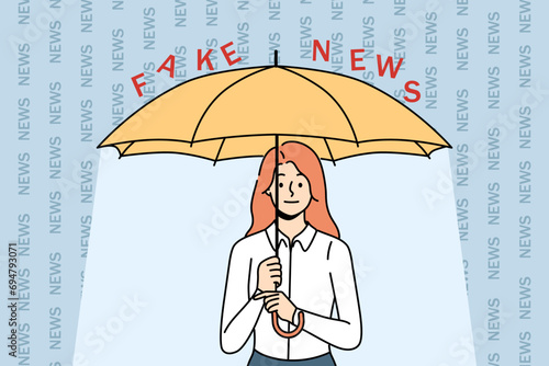 Woman covers herself with umbrella from fake news and disinformation, for concept combating harmful propaganda. Girl resists and maintains information hygiene hiding from fake news