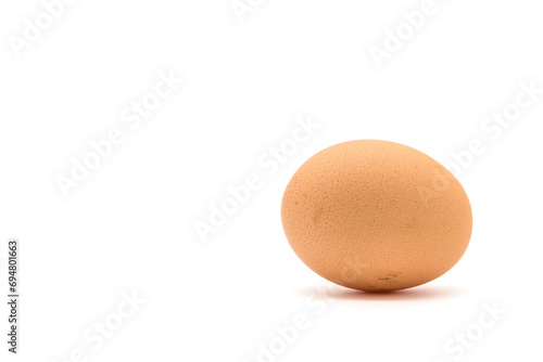 Brown chicken egg isolated on a white background