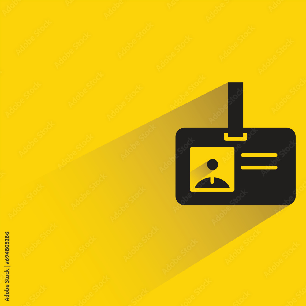 id card with shadow on yellow background id card with shadow on yellow background